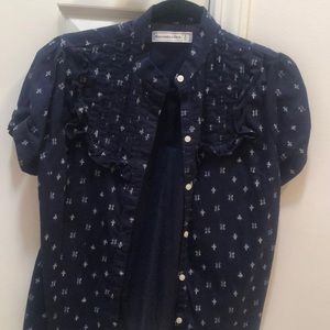 Blue top with white flowers